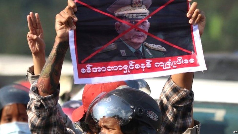 Myanmar coup leader defends action amid mass protests
